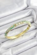 Mineli Pirinç Zirkon Taşlı Yeşil Çiçek Motifli Gold Renk Kadın Kelepçe - TJ-BB7450