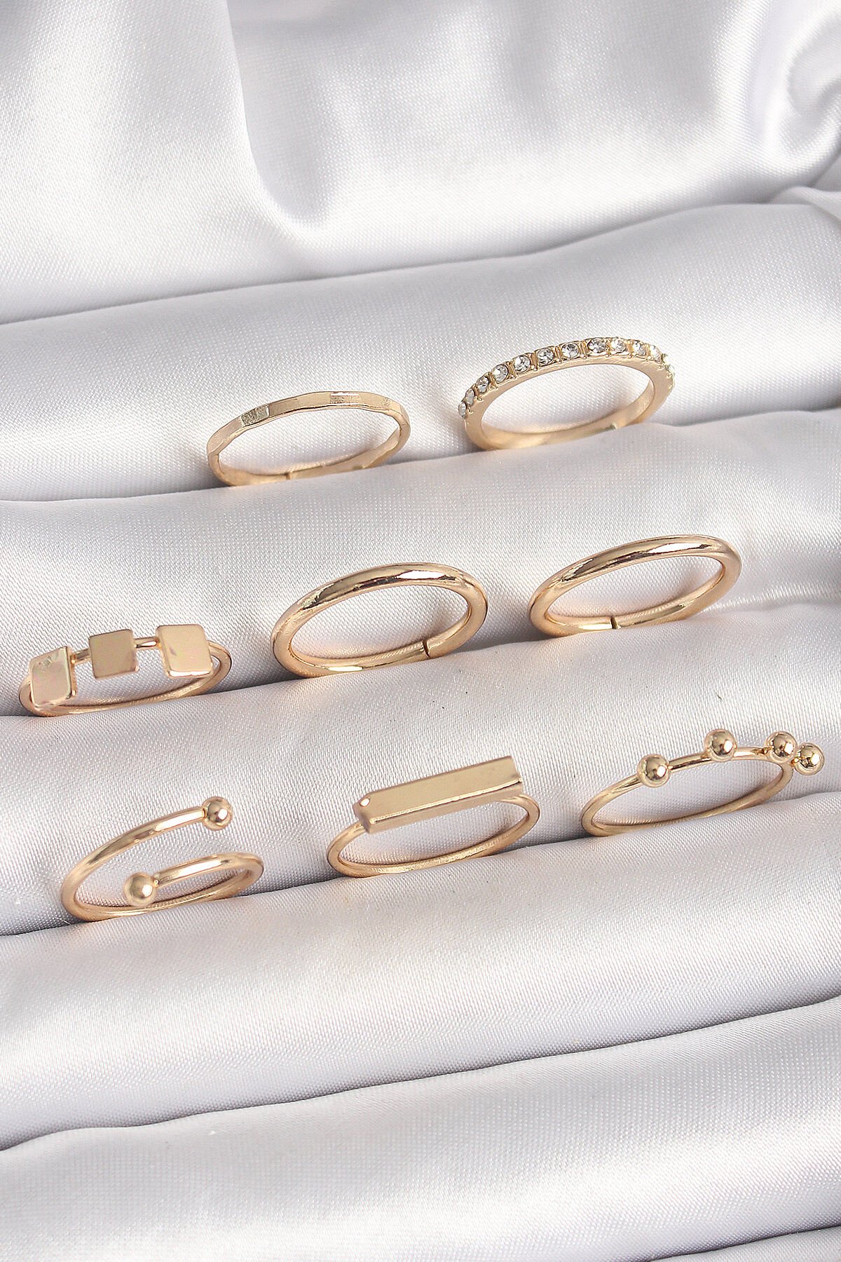 Pirinç Gold Renk Goemetrik Sembol Model Zirkon Taş Detaylı Kadın Yüzük Kombini - TJ-BYK3665