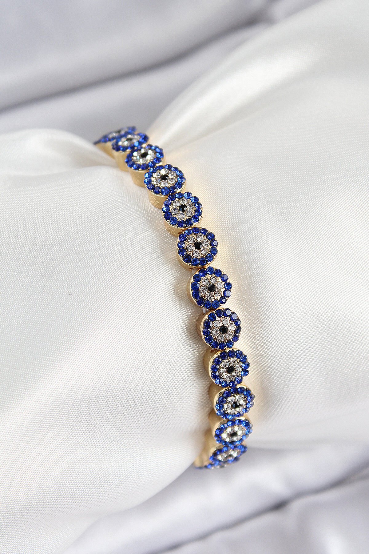 Pirinç Zirkon Taşlı Lacivert Nazar Model Gold Renk Lastikli Kadın Bileklik - TJ-BB7495