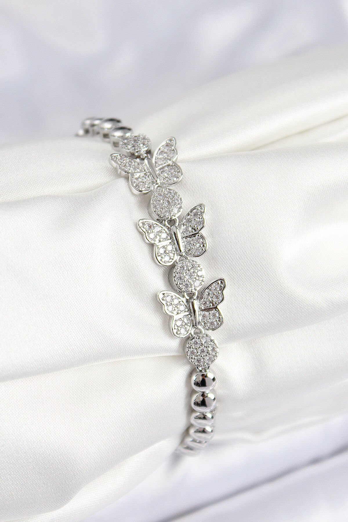 Pirinç Zirkon Taşlı Kelebek Model Gümüş Renk Kadın Bileklik - TJ-BB7542