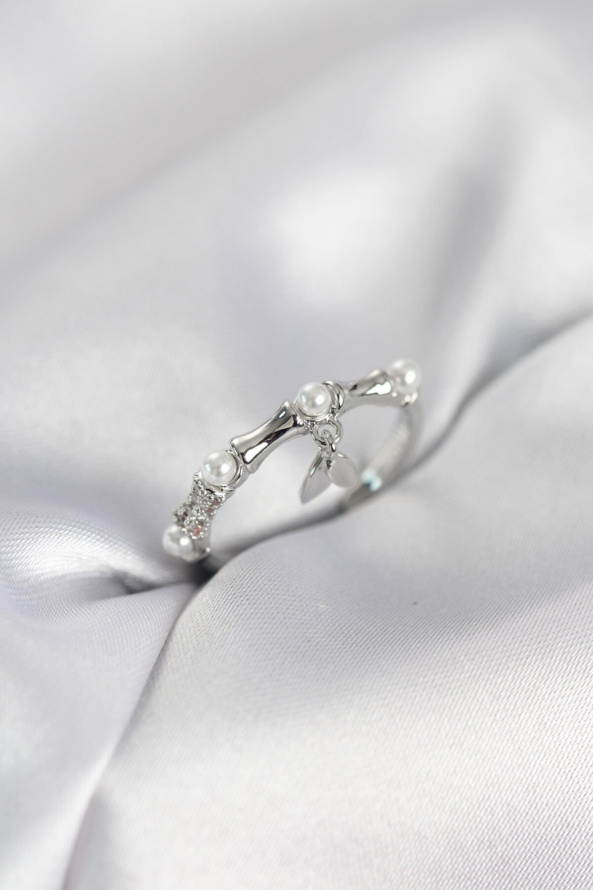 Gümüş Renk Sallantılı Kemik Model Kadın Yüzük - TJ-BYK4114